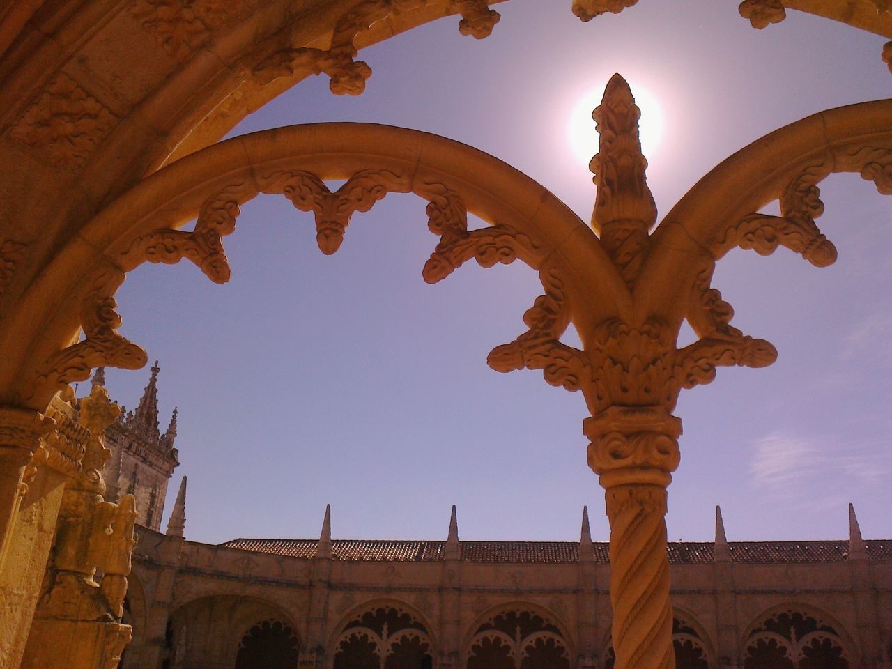 LOW ANGLE VIEW OF A STATUE OF A TEMPLE