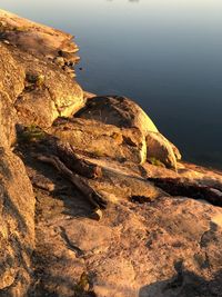 High angle view of rock formations on shore