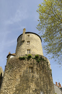 Low angle view of historic building against sky