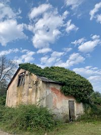 Low angle view of old building against sky