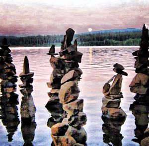 Wooden posts in lake