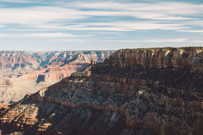 Scenic view of grand canyon national park against cloudy sky