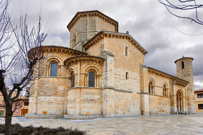 Low angle view of old building against sky