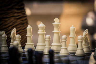 Close-up of chess pieces on board