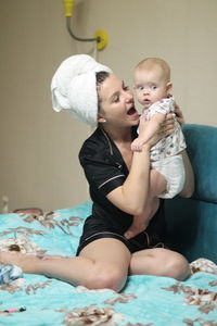 Mother and daughter at home