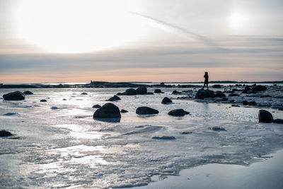 Scenic view of sea against sky during sunset