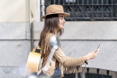 Young woman using mobile phone