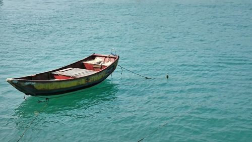 Boat moored on sea