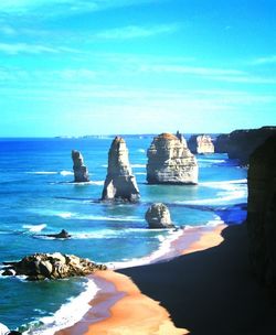 Scenic view of sea against blue sky