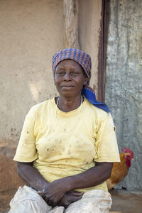 Portrait of man sitting outdoors