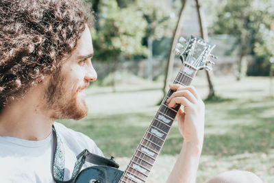 Young man playing guitar