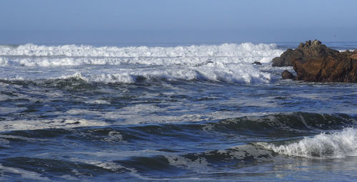 Scenic view of frozen sea against sky