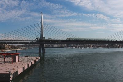  atatürk bridge over river in city  istanbul against sky