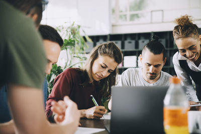 Group of people working on table