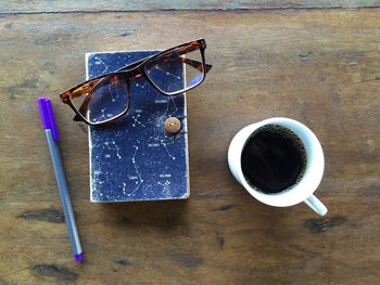 High angle view of coffee cup on table