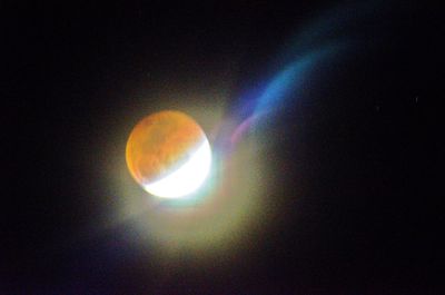 Low angle view of moon in sky