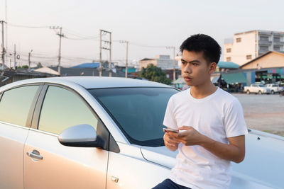 Young man using smart phone