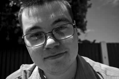 Portrait of man wearing eyeglasses