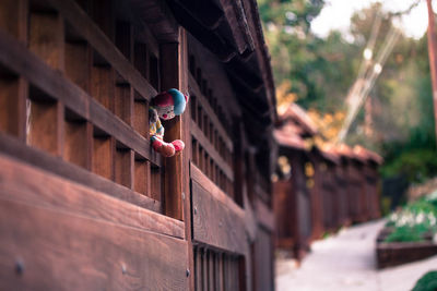 Low angle view of child on building