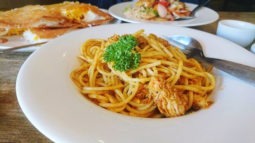 Close-up of noodles in plate on table