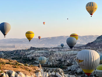 Hot air balloons flying in a beautiful landscape view