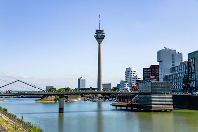 Tower in harbor called medienhafen at the river rhine in düsseldorf, germany.