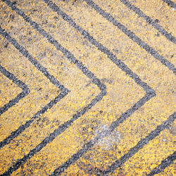 High angle view of road marking on field