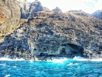 Scenic view of sea against mountain