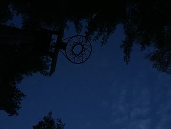 Low angle view of trees against sky