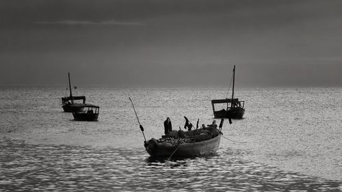 Boat on sea against sky
