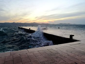 Scenic view of sea against sky during sunset