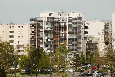 Buildings in city against sky