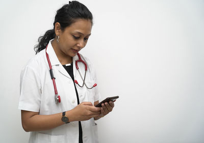 Young woman using mobile phone