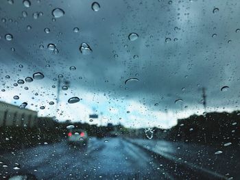 View of rain drops on road