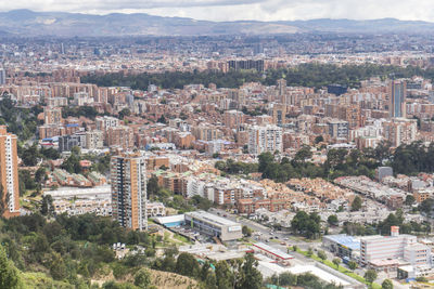 High angle view of townscape against mountains