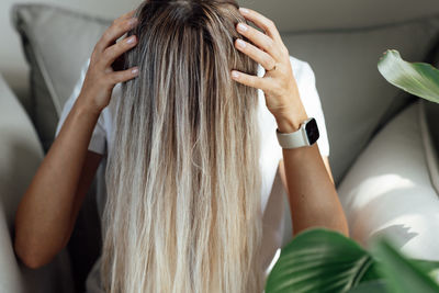 Midsection of woman with long hair