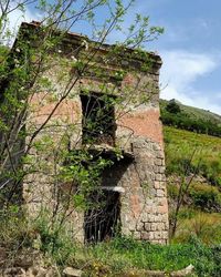 Low angle view of abandoned building