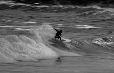 Man surfing in sea