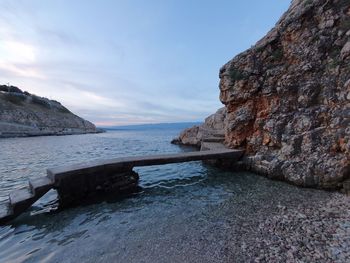 Rocky ancient look beach with sky