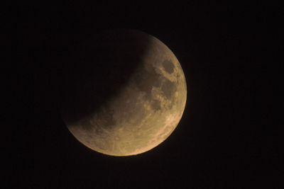 Low angle view of moon against sky at night