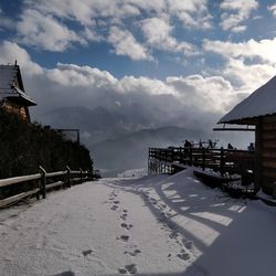 Scenic view of sea against sky during winter