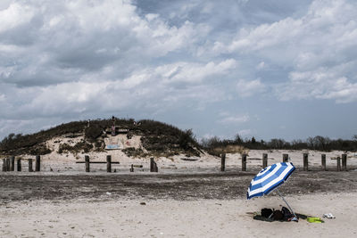 Scenic view of beach against sky