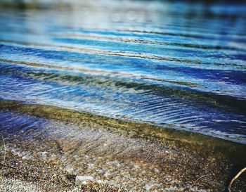 Close-up of wave on beach