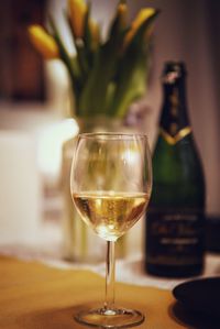 Close-up of wine in glass on table