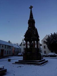 Low angle view of church against blue sky