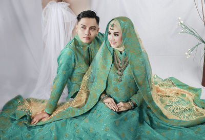 Photo of a bride and groom in indian wedding attire