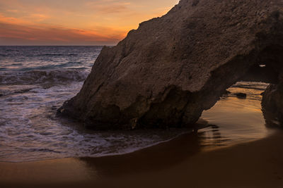 Scenic view of sea against sky at sunset