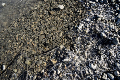 Full frame shot of pebbles on beach