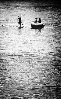 People on boat in sea