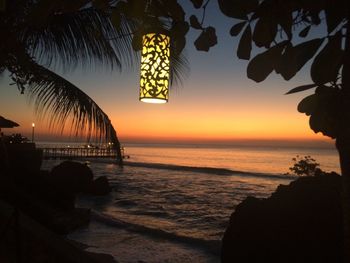 View of beach at sunset